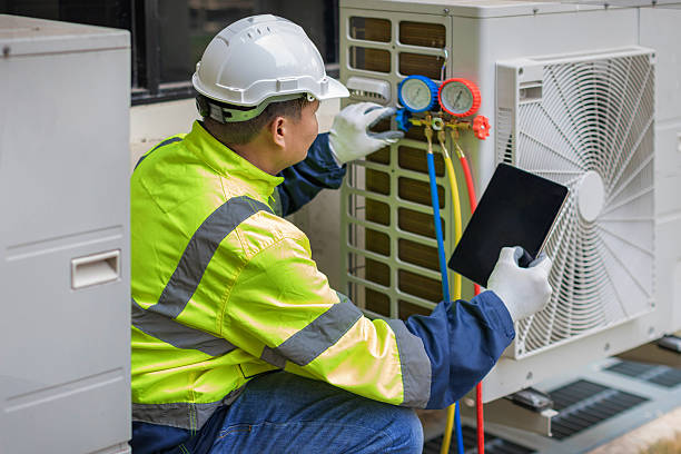 Professional Air Conditioning Repair technician working in Thayer, IL
